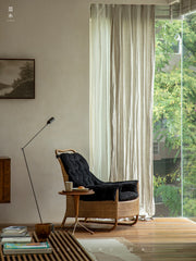 rattan lounge chair, rattan armchair, handwoven rattan furniture, natural rattan chair, relaxing chair, bohemian interior design, handcrafted rattan seating