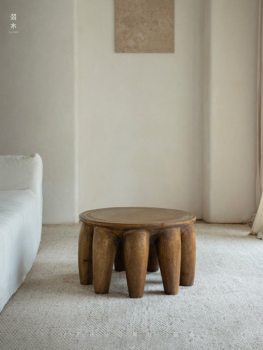 claw coffee table, solid wood coffee table, sculptural wood table, organic form table, handcrafted furniture, wabi sabi furniture, piexlculpt studio, round wooden table, low wood table, designer furniture