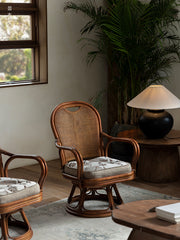 rattan swivel chair, rattan lounge chair, rotating rattan chair, handcrafted chair, natural rattan furniture, handwoven lounge seat, bohemian home decor