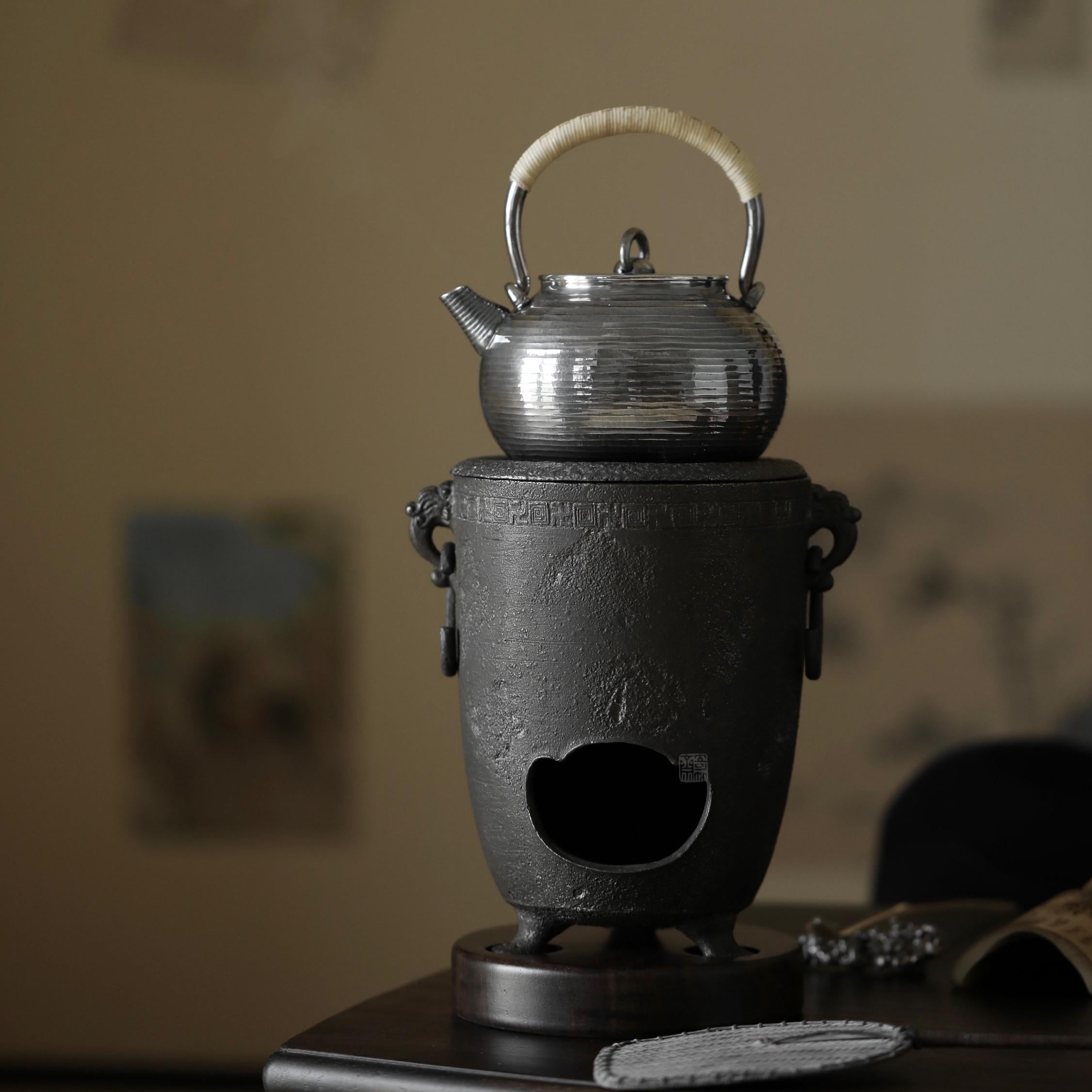 cast iron tea stove, portable tea heater, charcoal brazier, japanese tea stove, gongfu tea accessories, handmade tea tools, Piexlculpt Studio, tea ceremony heater, traditional iron brazier, wood engraving art, charcoal tea warmer