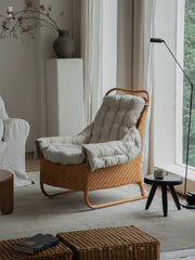 rattan lounge chair, rattan armchair, handwoven rattan furniture, natural rattan chair, relaxing chair, bohemian interior design, handcrafted rattan seating