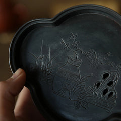 The Meika Tin Tea Vessel by Piexlculpt combines traditional craftsmanship with poetic artistry. Each piece is made from pure tin and engraved by hand with plum blossoms and ancient verse — a perfect fusion