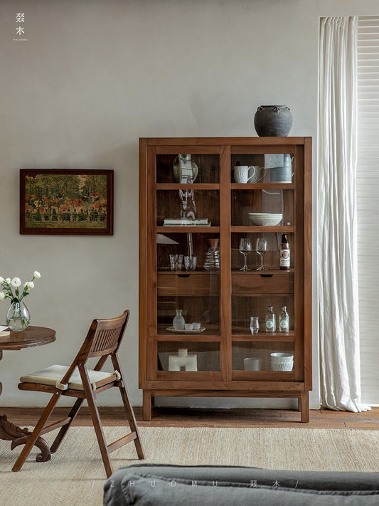 teak glass cabinet, solid wood display shelf, handcrafted teak furniture, glass door cabinet, artisan teak bookcase, minimalist wood furniture, wabi-sabi cabinet, boho wood storage, japanese scandi furniture