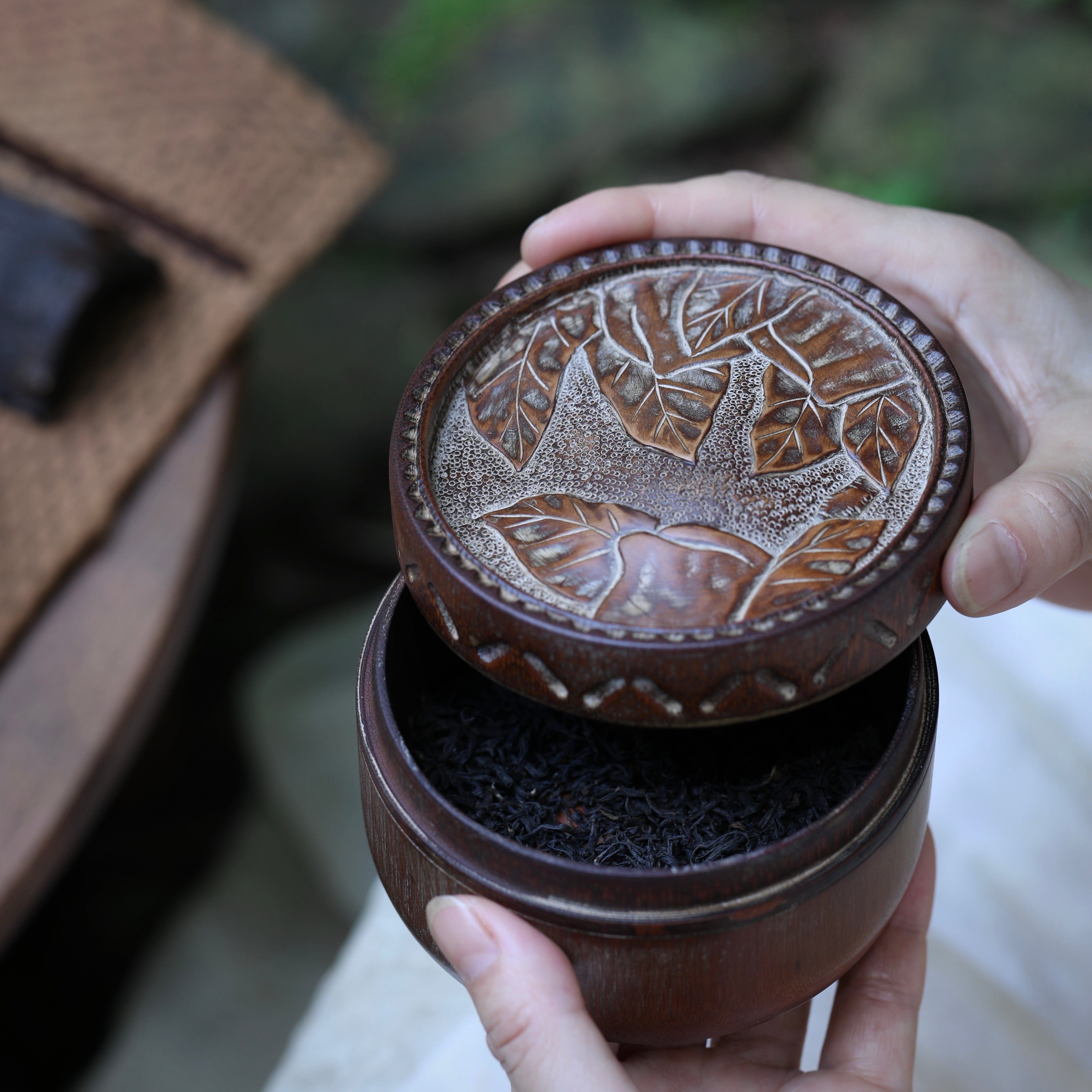 bamboo tea caddy, carved bamboo tea canister, leaf pattern tea jar, airtight tea storage, handcrafted tea container, wood engraving art, Piexlculpt Studio, artisan bamboo crafts, japanese tea box, loose leaf storage jar
