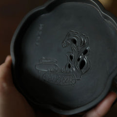 The Meika Tin Tea Vessel by Piexlculpt combines traditional craftsmanship with poetic artistry. Each piece is made from pure tin and engraved by hand with plum blossoms and ancient verse — a perfect fusion