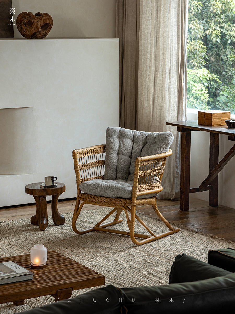 rattan armchair, rattan lounge chair, handwoven rattan furniture, natural rattan chair, outdoor rattan seating, bohemian interior design, handcrafted rattan armchair