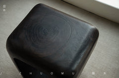 void side table, hollow wood stool, sculptural wood furniture, solid wood table, carbon black finish, minimalist furniture, wabi sabi design, piexlculpt studio, organic form furniture