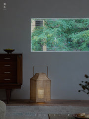 rattan lantern, wooden base lamp, handcrafted rattan light, wabi-sabi decor, natural rattan lighting, ambient table lamp, handmade home decor, rustic lantern, boho room lighting, artisan rattan lamp, minimalist home lamp, zen decor light, eco-friendly rattan lamp