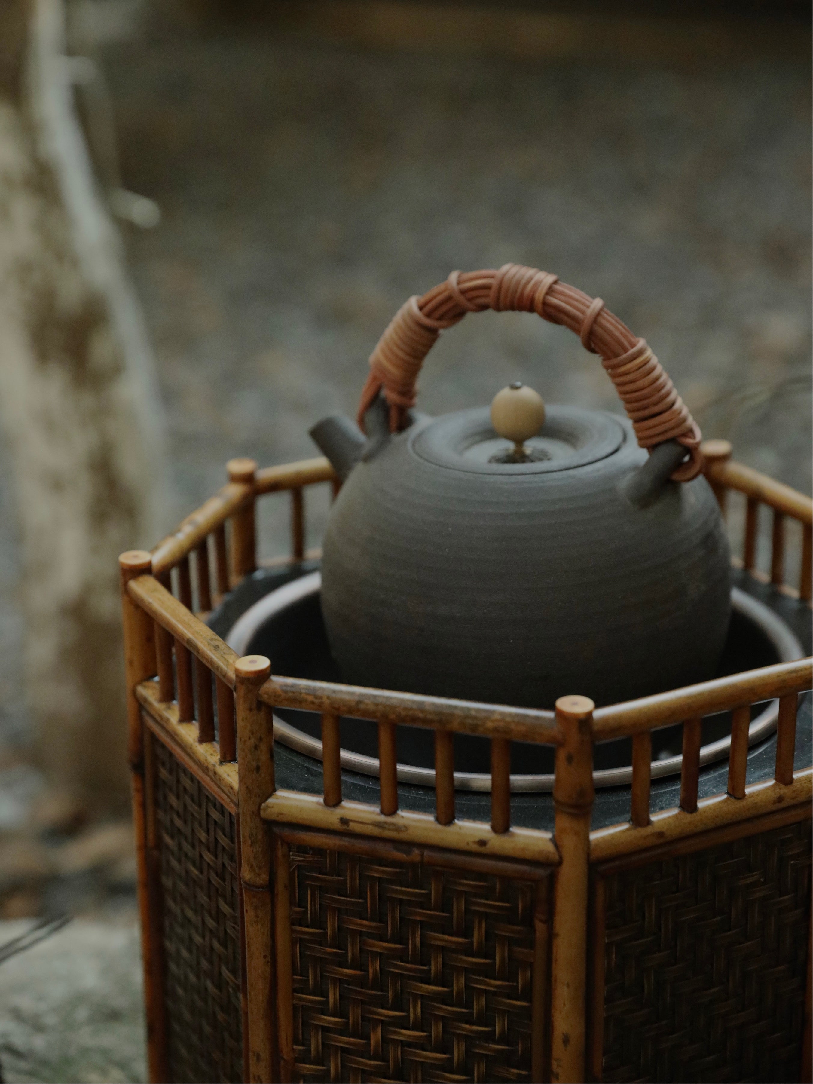 bamboo charcoal stove, tea brazier, tea heater, japanese tea stove, rattan bamboo fire pit, handcrafted tea tools, artisan tea warmer, wood engraving art, tea ceremony accessories, slow boil kettle base