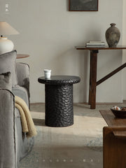 wood side table, solid wood accent table, hammered wood table, handmade wooden furniture, sculptural side table, rustic solid wood furniture, artisan carved table, textured wood decor, natural wood end table