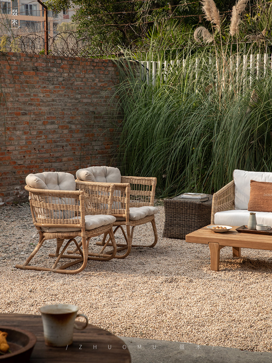 rattan armchair, rattan lounge chair, handwoven rattan furniture, natural rattan chair, outdoor rattan seating, bohemian interior design, handcrafted rattan armchair