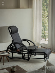 rattan recliner, rattan lounge chair, handwoven rattan furniture, vintage rattan chair, bamboo recliner, natural rattan seat, handcrafted rattan lounger, boho rattan furniture, southeast asian furniture