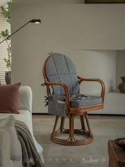 rattan swivel chair, handwoven rattan chair, rotating rattan chair, bamboo armchair, vintage rattan lounge chair, natural rattan furniture, handcrafted rattan seat, dining rattan chair, tea room chair, boho rattan furniture