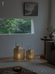 rattan lantern, wooden base lamp, handcrafted rattan light, wabi-sabi decor, natural rattan lighting, ambient table lamp, handmade home decor, rustic lantern, boho room lighting, artisan rattan lamp, minimalist home lamp, zen decor light, eco-friendly rattan lamp