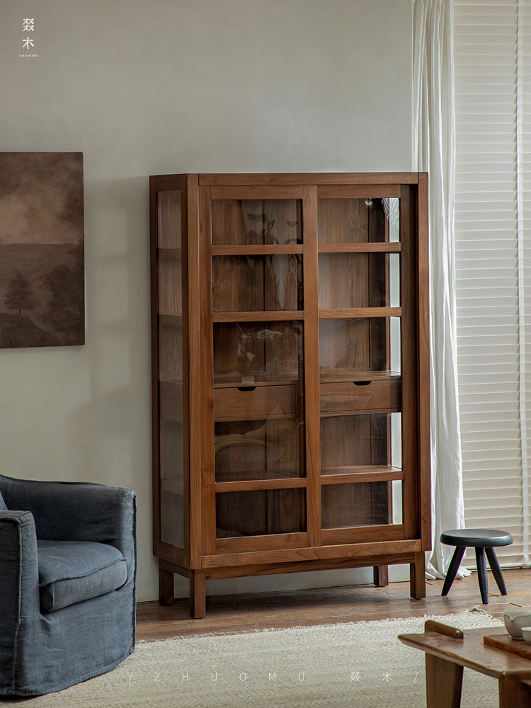 teak glass cabinet, solid wood display shelf, handcrafted teak furniture, glass door cabinet, artisan teak bookcase, minimalist wood furniture, wabi-sabi cabinet, boho wood storage, japanese scandi furniture