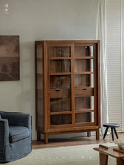 teak glass cabinet, solid wood display shelf, handcrafted teak furniture, glass door cabinet, artisan teak bookcase, minimalist wood furniture, wabi-sabi cabinet, boho wood storage, japanese scandi furniture
