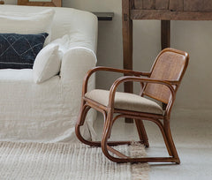 handcrafted rattan furniture, artisan bamboo chair, tropical rattan decor, natural rattan collection, handmade bamboo furniture, sustainable rattan furniture, Piexlculpt Studio, tropical home decor, custom rattan furniture, lifetime care furniture