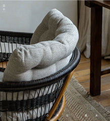 rattan armchair, rattan lounge chair, handwoven rattan furniture, natural rattan chair, outdoor rattan seating, bohemian interior design, handcrafted rattan armchair