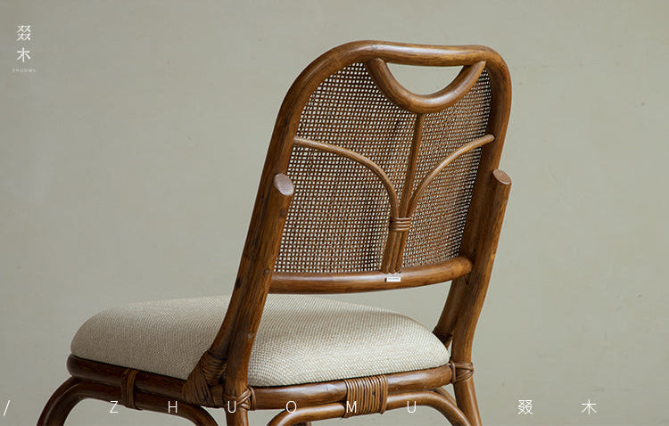 handcrafted rattan furniture, artisan bamboo chair, tropical rattan decor, natural rattan collection, handmade bamboo furniture, sustainable rattan furniture, Piexlculpt Studio, tropical home decor, custom rattan furniture, lifetime care furniture