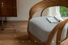 rattan lounge chair, designer rattan chair, handcrafted rattan furniture, modern accent chair, rattan armchair, handmade rattan seat, bohemian furniture, natural interior