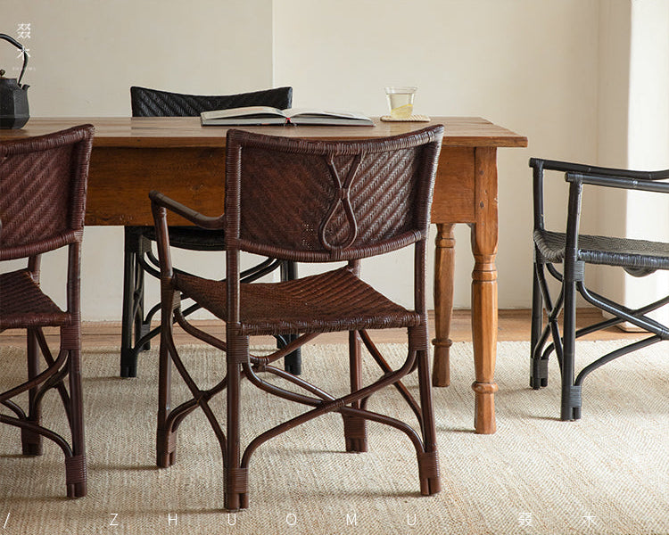 rattan dining chair, rattan armchair, black rattan chair, handwoven rattan furniture, bamboo dining chair, natural rattan seating, handcrafted rattan chair, southeast asian rattan furniture, minimalist dining chair