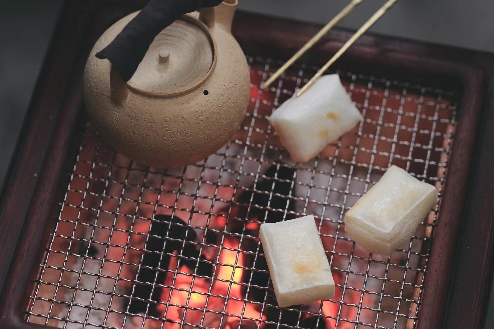 bamboo charcoal stove, pearwood tea brazier, handcrafted tea heater, wood tea stove, artisan charcoal brazier, traditional tea fire pot, gongfu tea accessories, wood engraving art, luxury tea ceremony set