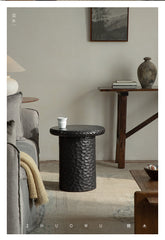 wood side table, solid wood accent table, hammered wood table, handmade wooden furniture, sculptural side table, rustic solid wood furniture, artisan carved table, textured wood decor, natural wood end table