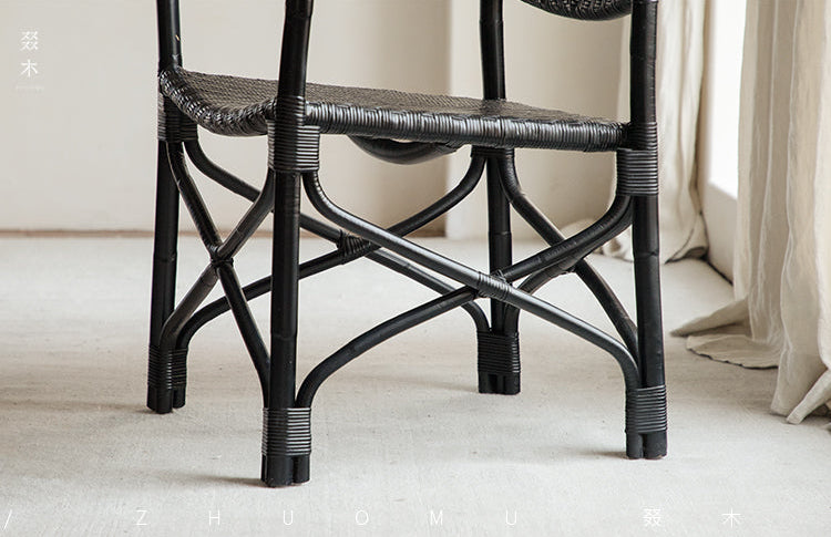 rattan dining chair, rattan armchair, black rattan chair, handwoven rattan furniture, bamboo dining chair, natural rattan seating, handcrafted rattan chair, southeast asian rattan furniture, minimalist dining chair