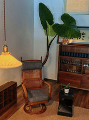 handcrafted rattan furniture, artisan bamboo chair, tropical rattan decor, natural rattan collection, handmade bamboo furniture, sustainable rattan furniture, Piexlculpt Studio, tropical home decor, custom rattan furniture, lifetime care furniture