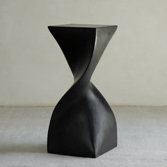 wood pedestal table, solid wood plant stand, sculptural wood side table, twist wooden table, handmade wood decor, rustic accent furniture, modern wood pedestal, artisan carved furniture, natural wood display stand