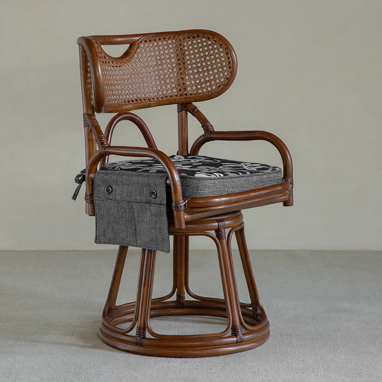 rattan swivel chair, handwoven rattan armchair, rotating rattan chair, vintage rattan seat, bamboo swivel chair, natural rattan furniture, handcrafted rattan lounge chair, tea room chair, dining rattan chair