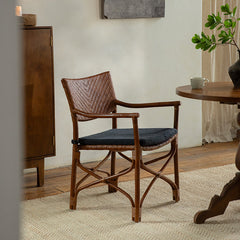 rattan dining chair, rattan armchair, black rattan chair, handwoven rattan furniture, bamboo dining chair, natural rattan seating, handcrafted rattan chair, southeast asian rattan furniture, minimalist dining chair