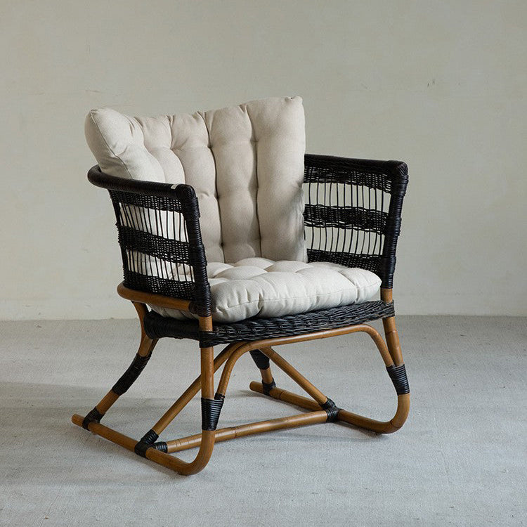 rattan armchair, rattan lounge chair, handwoven rattan furniture, natural rattan chair, outdoor rattan seating, bohemian interior design, handcrafted rattan armchair