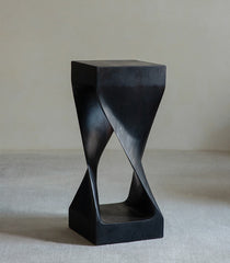 twist side table, sculptural wood stool, solid wood side table, carbon black furniture, wabi sabi furniture, minimalist furniture, piexlculpt studio, wooden pedestal table, organic design