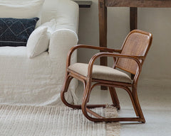 handcrafted rattan furniture, artisan bamboo chair, tropical rattan decor, natural rattan collection, handmade bamboo furniture, sustainable rattan furniture, Piexlculpt Studio, tropical home decor, custom rattan furniture, lifetime care furniture