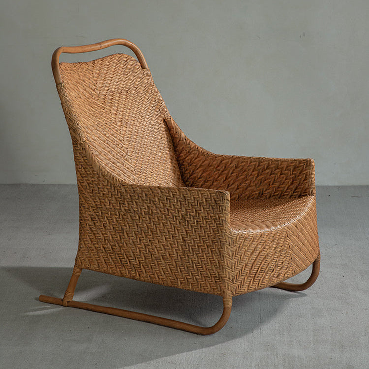 rattan lounge chair, rattan armchair, handwoven rattan furniture, natural rattan chair, relaxing chair, bohemian interior design, handcrafted rattan seating