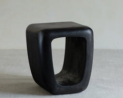 void side table, hollow wood stool, sculptural wood furniture, solid wood table, carbon black finish, minimalist furniture, wabi sabi design, piexlculpt studio, organic form furniture
