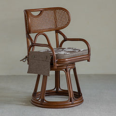 rattan swivel chair, handwoven rattan armchair, rotating rattan chair, vintage rattan seat, bamboo swivel chair, natural rattan furniture, handcrafted rattan lounge chair, tea room chair, dining rattan chair