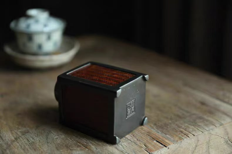 metal tea caddy, bamboo tea jar, airtight tea storage, handcrafted tea container, square tea canister, hexagonal tea caddy, bamboo weaving decor, Piexlculpt Studio, modern tea storage, artisanal tea accessory