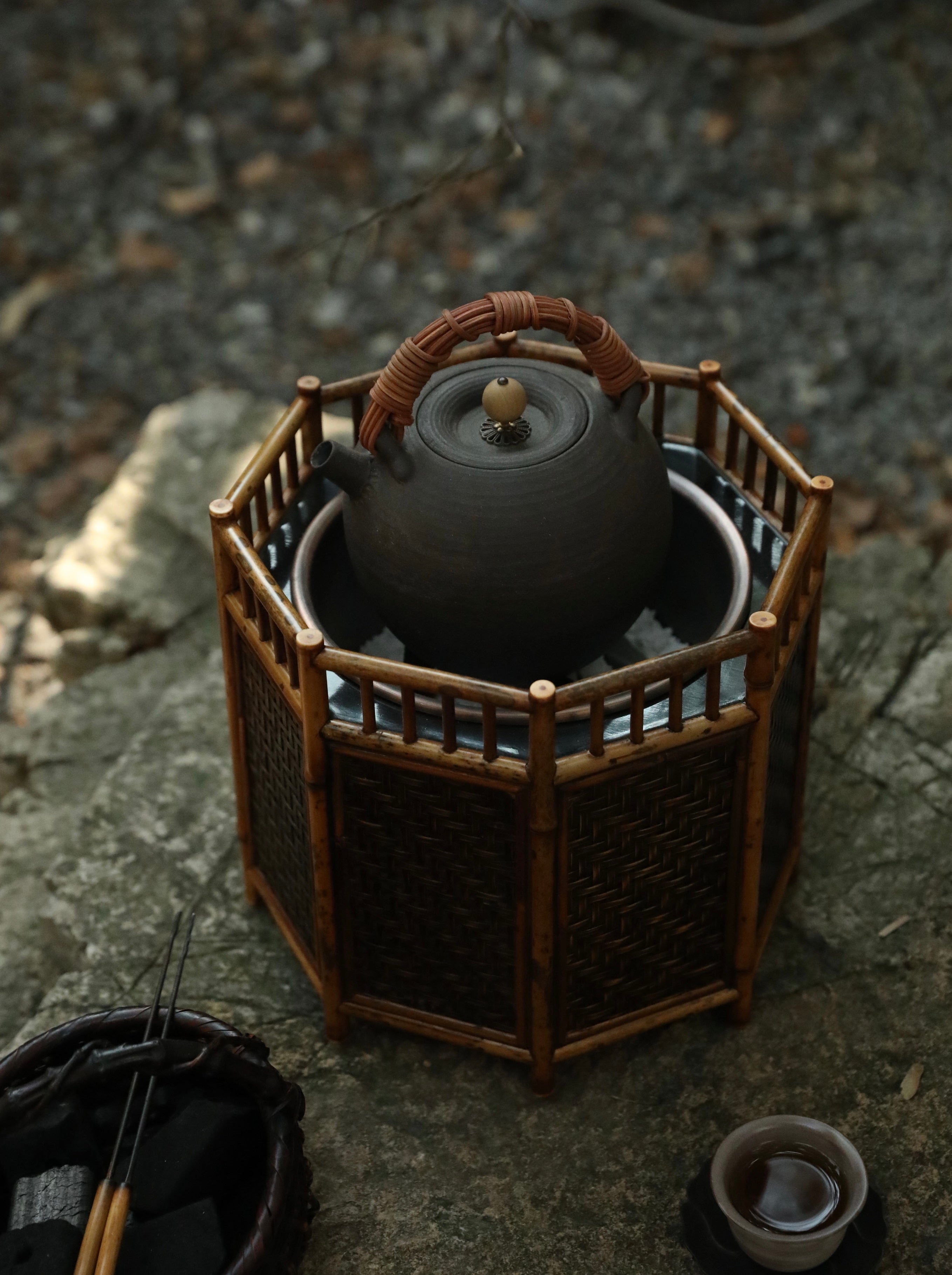 bamboo charcoal stove, tea brazier, tea heater, japanese tea stove, rattan bamboo fire pit, handcrafted tea tools, artisan tea warmer, wood engraving art, tea ceremony accessories, slow boil kettle base