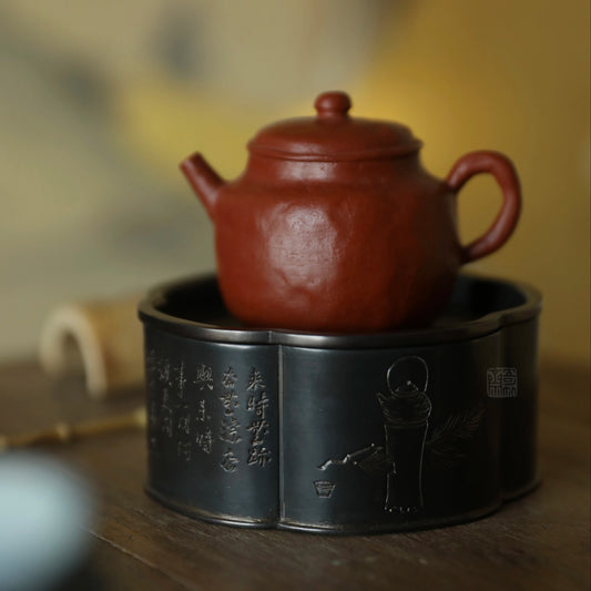 The Meika Tin Tea Vessel by Piexlculpt combines traditional craftsmanship with poetic artistry. Each piece is made from pure tin and engraved by hand with plum blossoms and ancient verse — a perfect fusion
