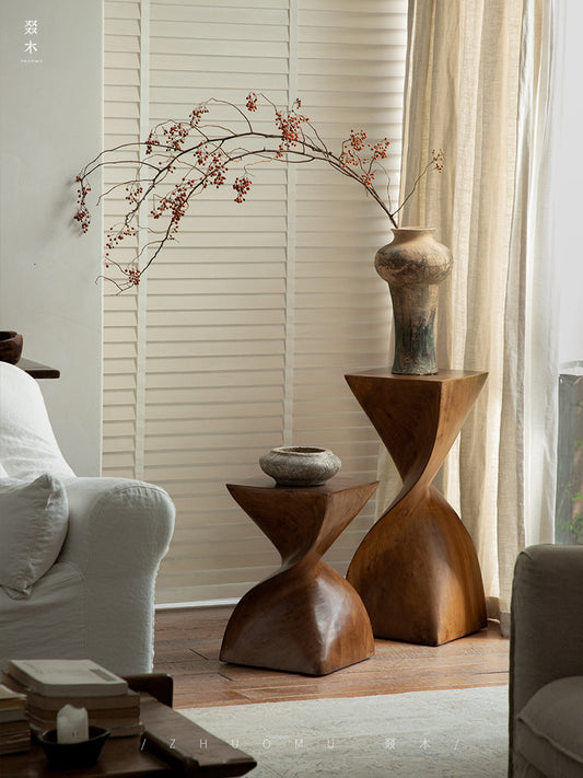 wood pedestal table, solid wood plant stand, sculptural wood side table, twist wooden table, handmade wood decor, rustic accent furniture, modern wood pedestal, artisan carved furniture, natural wood display stand