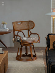 rattan swivel chair, handwoven rattan armchair, rotating rattan chair, vintage rattan seat, bamboo swivel chair, natural rattan furniture, handcrafted rattan lounge chair, tea room chair, dining rattan chair