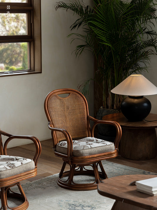 rattan swivel chair, rattan lounge chair, rotating rattan chair, handcrafted chair, natural rattan furniture, handwoven lounge seat, bohemian home decor