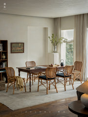 handcrafted rattan furniture, artisan bamboo chair, tropical rattan decor, natural rattan collection, handmade bamboo furniture, sustainable rattan furniture, Piexlculpt Studio, tropical home decor, custom rattan furniture, lifetime care furniture