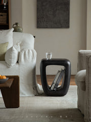 void side table, hollow wood stool, sculptural wood furniture, solid wood table, carbon black finish, minimalist furniture, wabi sabi design, piexlculpt studio, organic form furniture