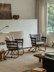 rattan armchair, rattan lounge chair, handwoven rattan furniture, natural rattan chair, outdoor rattan seating, bohemian interior design, handcrafted rattan armchair