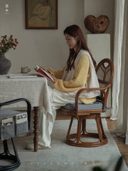 rattan swivel chair, handwoven rattan chair, rotating rattan chair, bamboo armchair, vintage rattan lounge chair, natural rattan furniture, handcrafted rattan seat, dining rattan chair, tea room chair, boho rattan furniture