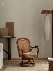 rattan swivel chair, rattan lounge chair, rotating rattan chair, handcrafted chair, natural rattan furniture, handwoven lounge seat, bohemian home decor