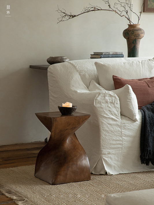 wood pedestal table, solid wood plant stand, sculptural wood side table, twist wooden table, handmade wood decor, rustic accent furniture, modern wood pedestal, artisan carved furniture, natural wood display stand